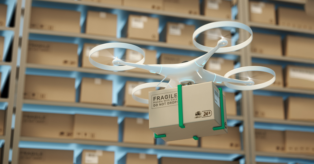 drone carrying a box in a shipping warehouse