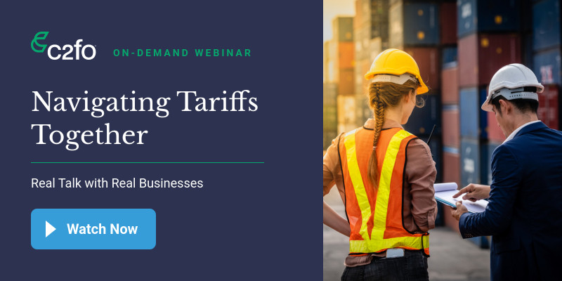 Two people in safety gear talk in a shipping yard with stacked containers. Text on left reads: "Navigating Tariffs Together - Real Talk with Real Businesses." Gain tariff insights. A blue button below says "Watch Now.