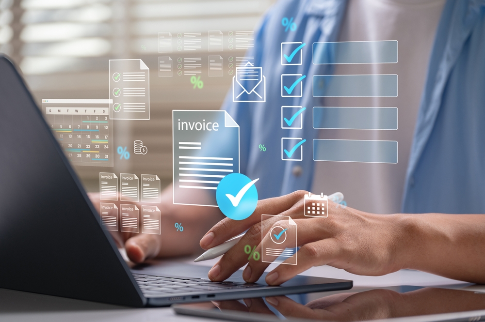 Person using a laptop with digital invoice, checklist, and foreign exchange risk icons—online business tasks.