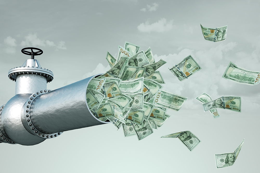 A large metal pipe spews flying US dollar bills, symbolizing production financing, into a cloudy sky.